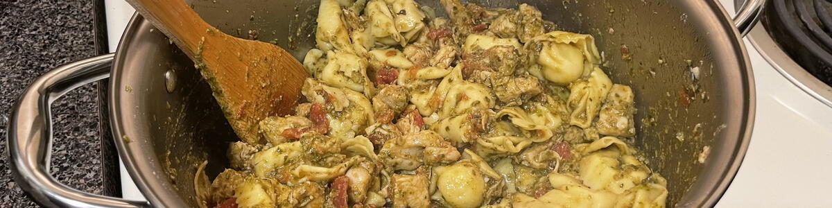 Chicken pesto tortellini in pot on stove
