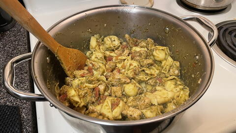 Chicken pesto tortellini in pot on stove